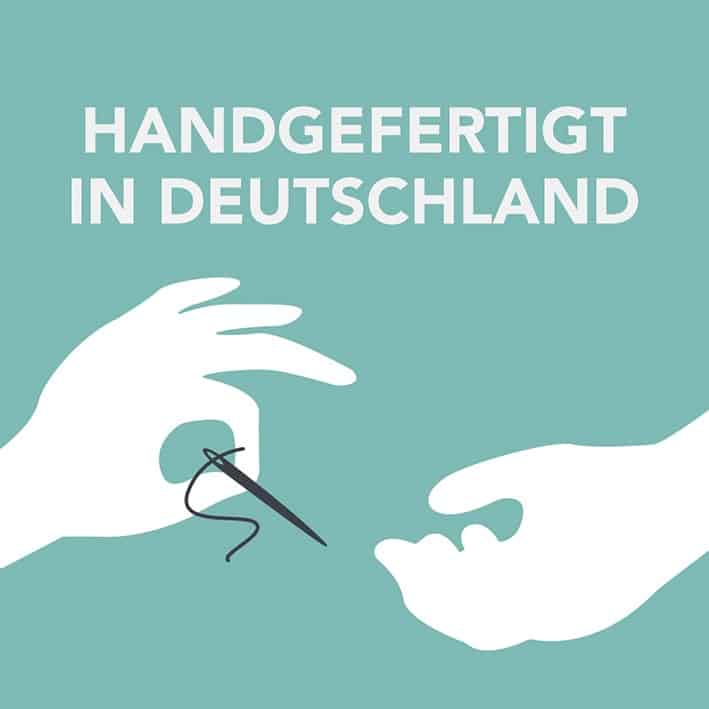 Symbol: Handgefertigt in Deutschland, zwei Hände mit Nadel und Faden